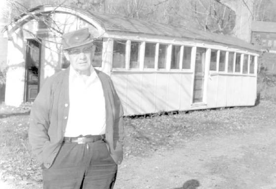 John Dilego with his former diner in his yard in Cheshire, Mass, courtesy of North Adams Transcript