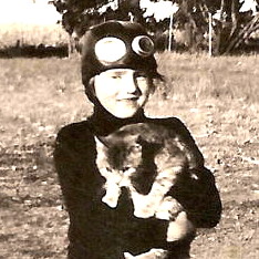 Claudine wearing aviator helmet, probably inspired by Amelia Earhart, late 1930s