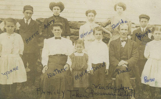 Deschenes family, 1910, the year before Lewis Hine photographed them.