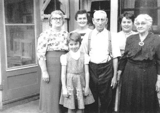 Lumina Desmarais Dube (left), father Zoel (ctr) & mother Alexina (right), 1957. Provided by family.