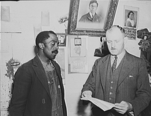 Photo was taken inside Nat's new house. The man in the photo on the wall is Nat at a younger age.