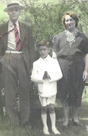 Paul, Lumina & Richard Dube, First Communion. Photo provided by family.