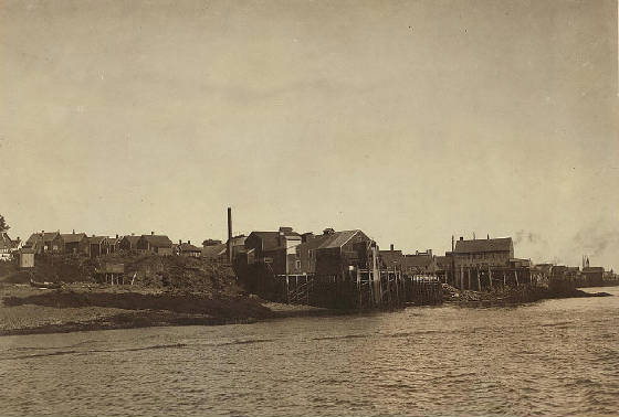 Sardine canneries at Eastport, Maine. Location: Eastport, Maine, August 1911, Lewis Hine.