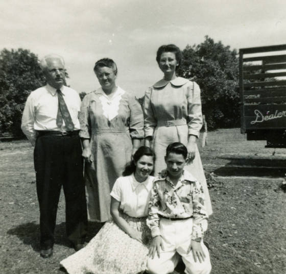 Standing (L-R): Jesse Young, wife Mildred, her sister Marie; children Carolyn and Selwyn, 1949.