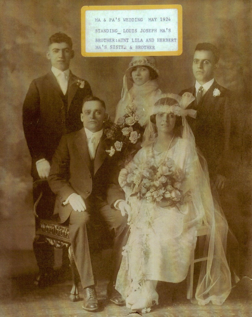 Julia with husband Domenic Tuliano (both seated) on their wedding day. Photo provided by family.