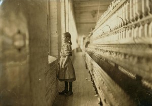 Rhodes Mfg. Co., Lincolnton, N.C. Spinner. A moment's glimpse of the outer world. Said she was 10 years old. Been working over a year. Location: Lincolnton, North Carolina, November 1908, Lewis Hine