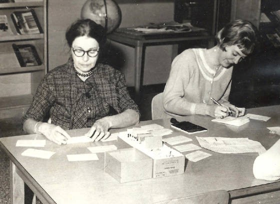 Betsy Price Green (left) at the library. All photos courtesy of Betsy's family, except where noted.