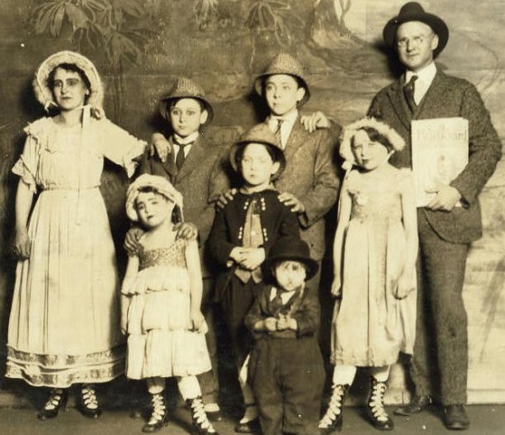 Capps Family, 1917. Photo by Lewis Hine. (L-R): Back row: Pearl (mother), Earl, Kendall, Edward (father); middle row: Bridget (Bee), Edward Jr., Edith; front: Orville.