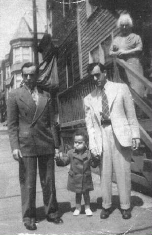 (L-R): Edward, Ralph (Carmine's son), Carmine, and Bertha Zizza, the boys' mother. About 1944.