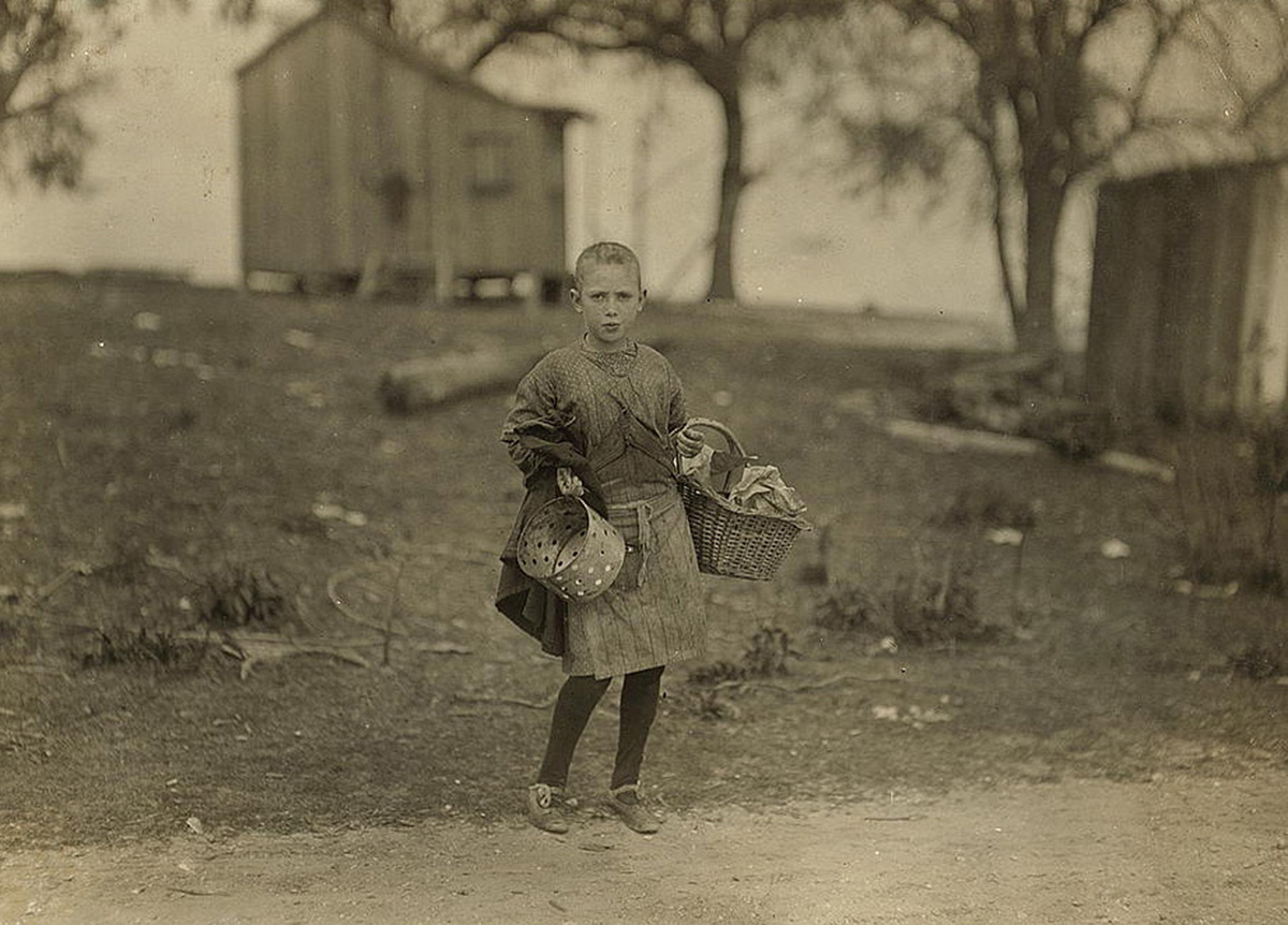 My caption: Sadie Kelly, 11 years old. Lives in Baltimore, Maryland, works in Bay St. Louis, Mississippi, during the caning season. 